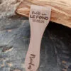 Lot de spatules à raclette en bois personnalisées avec gravure de prénoms et phrases humoristiques.